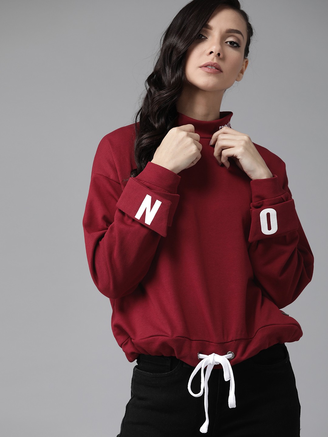 

Roadster Women Maroon Solid Sweatshirt