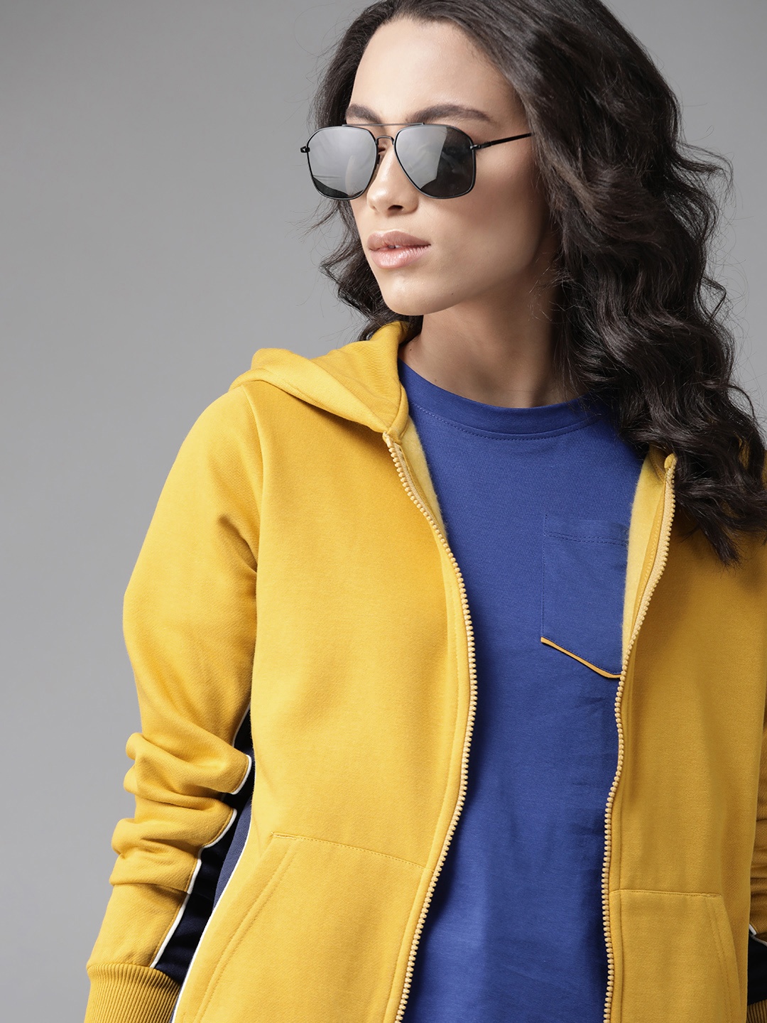 

Roadster Women Mustard Yellow Solid Hooded Sweatshirt