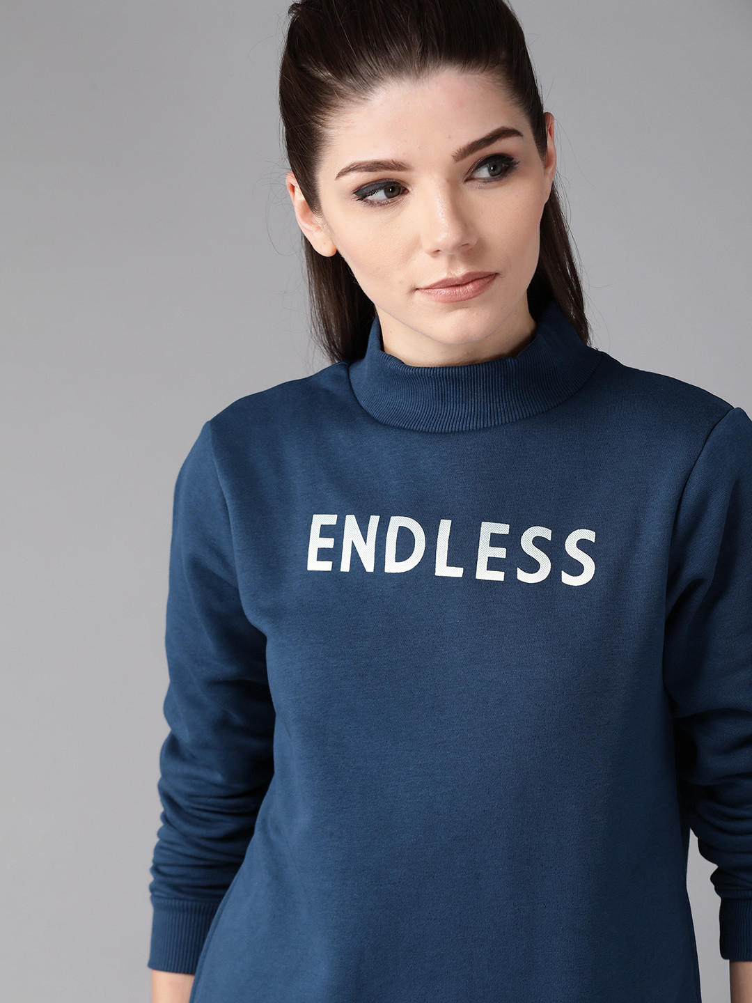 

Roadster Women Navy Blue Solid High Neck Sweatshirt