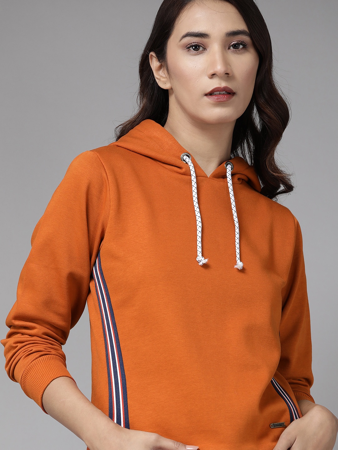 

Roadster Women Rust Orange Solid Hooded Sweatshirt