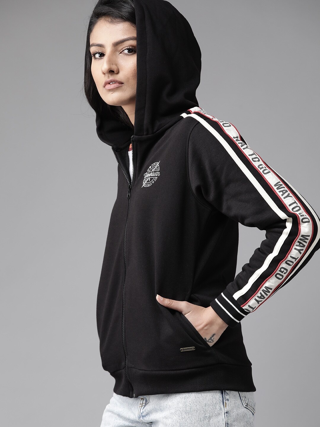 

Roadster Women Black Solid Hooded Sweatshirt