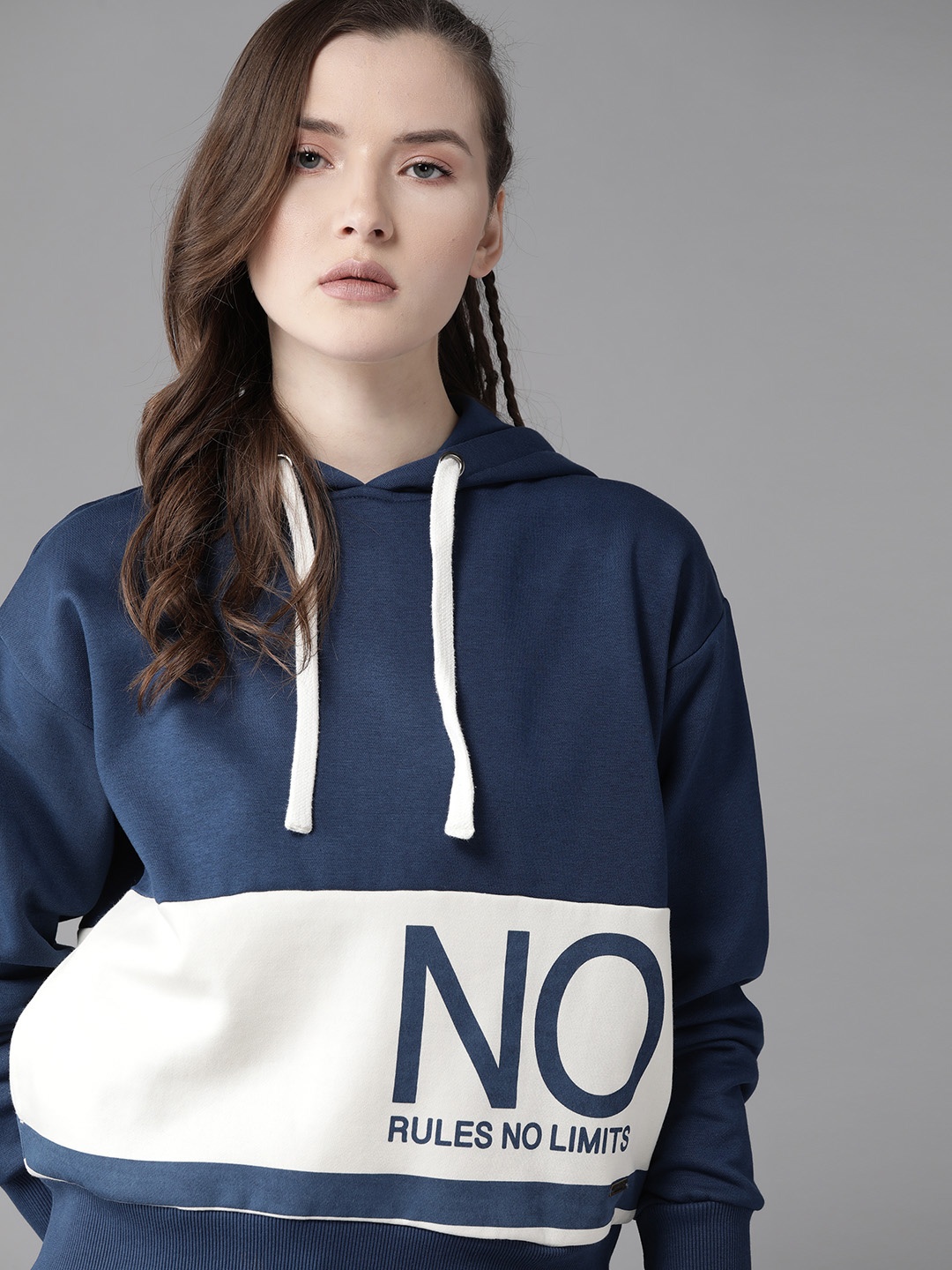 

Roadster Women Navy Blue & White Colourblocked Hooded Sweatshirt