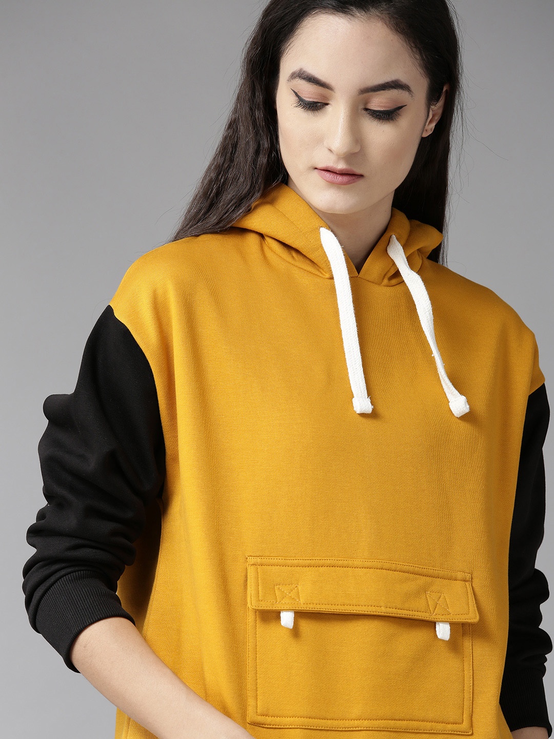 

Roadster Women Mustard Yellow & Black Solid Hooded Sweatshirt