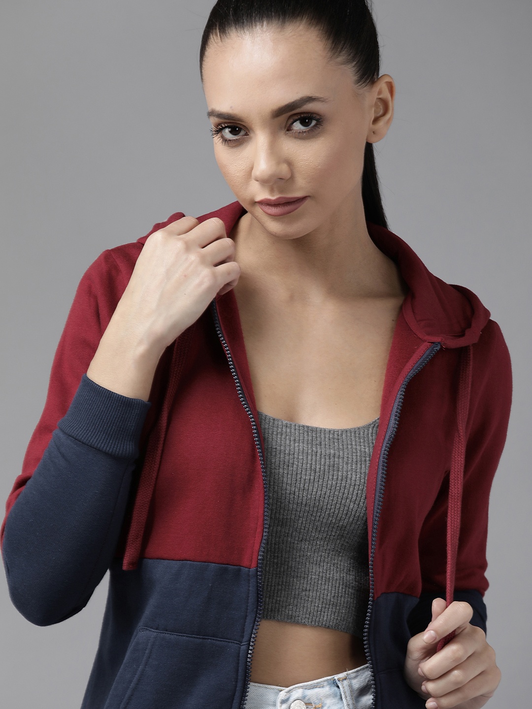

Roadster Women Maroon & Navy Blue Colourblocked Hooded Sweatshirt
