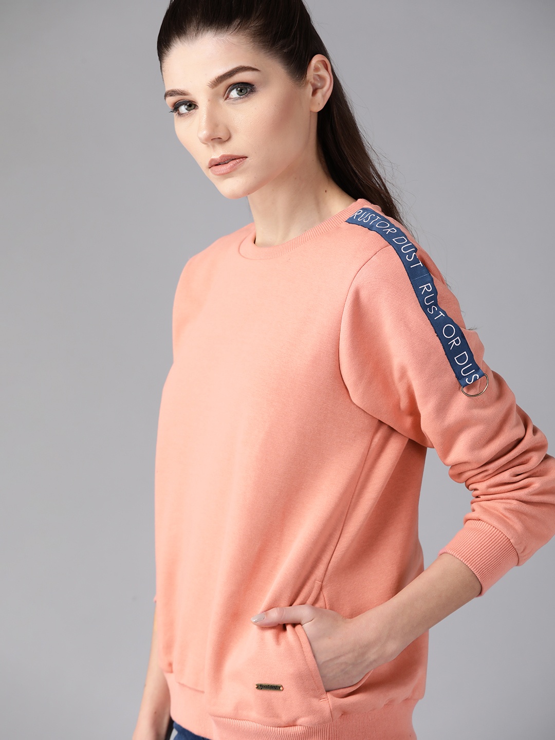 

Roadster Women Peach-Coloured Solid Sweatshirt
