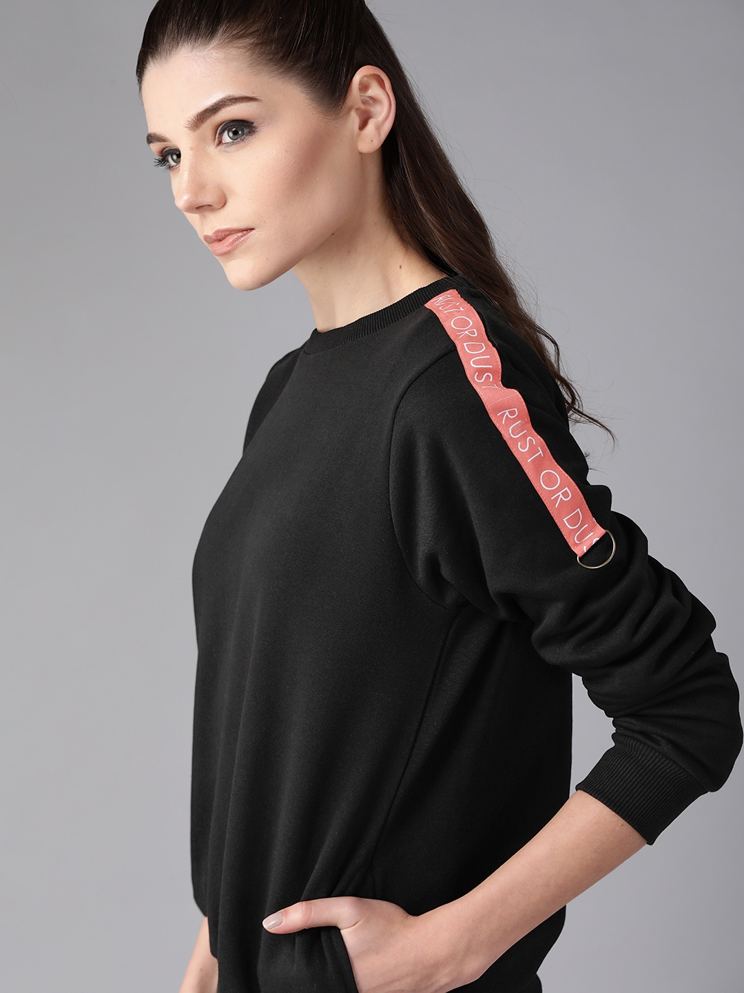 

Roadster Women Black Solid Sweatshirt
