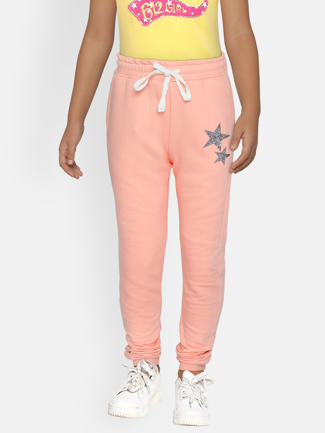 

Gini and Jony Girls Peach-Coloured Solid Joggers with Star Applique Detail