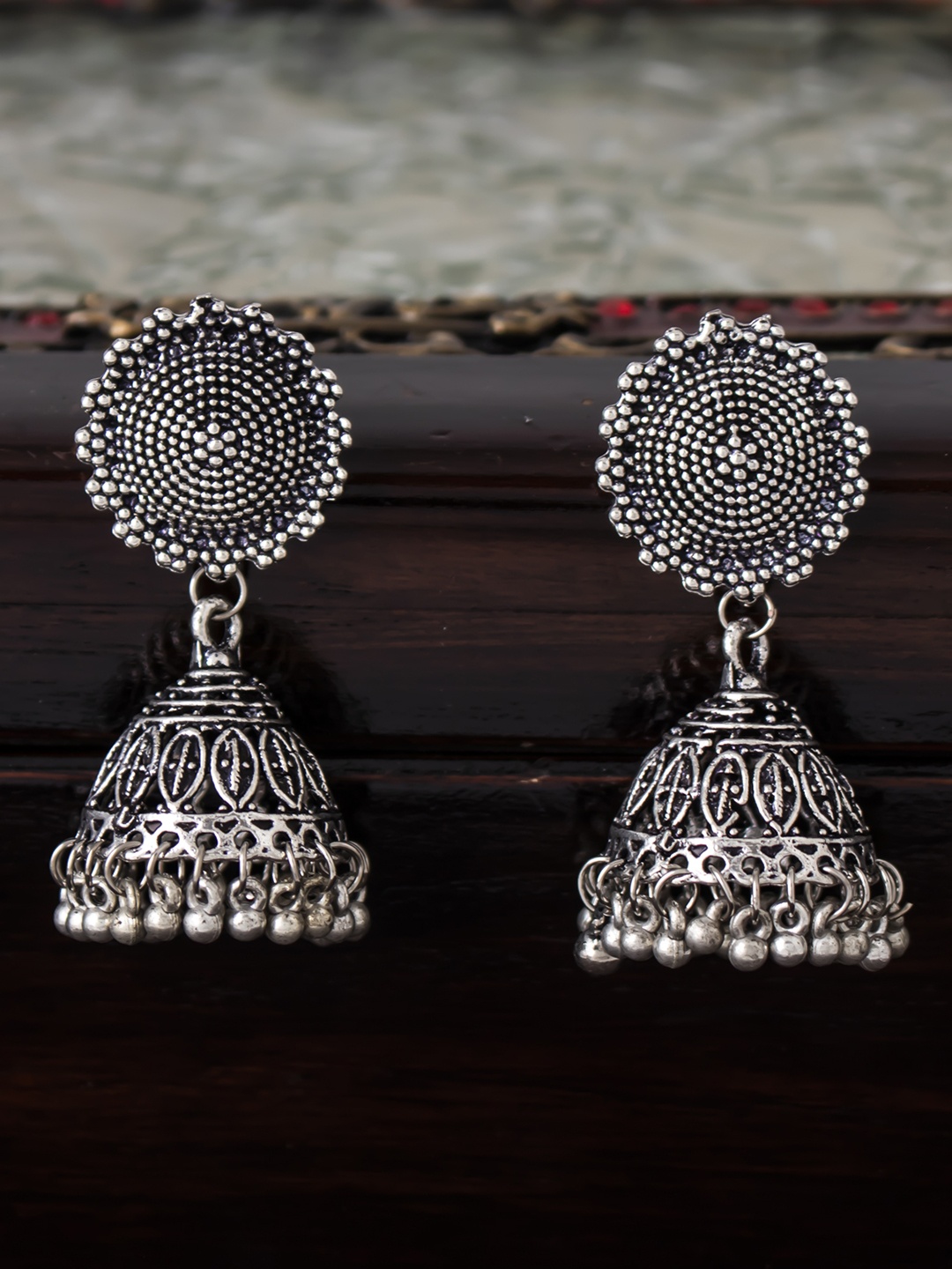 

Sukkhi Silver-Toned Dome Shaped Jhumkas