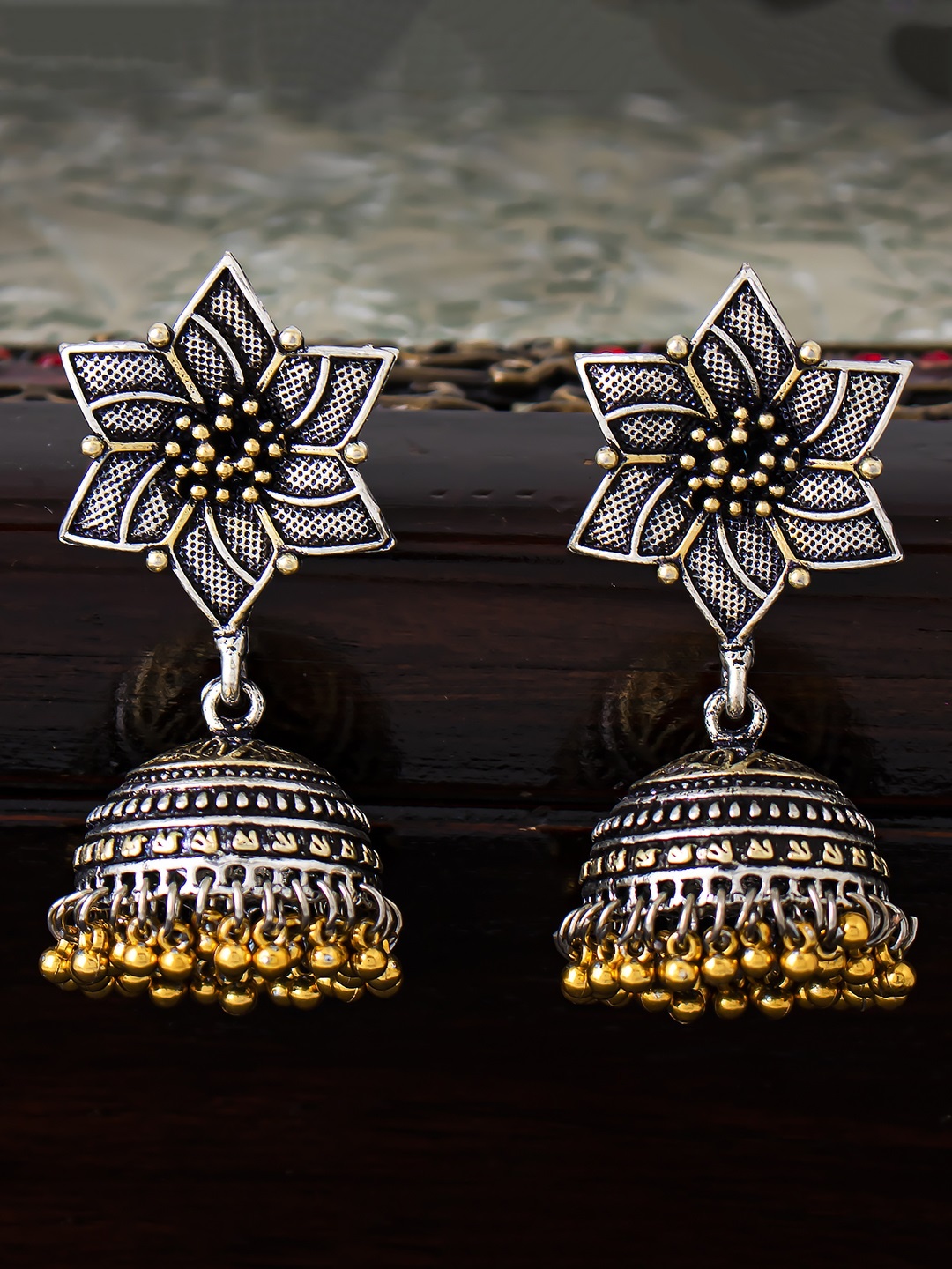 

Sukkhi Silver-Toned Dome Shaped Jhumkas