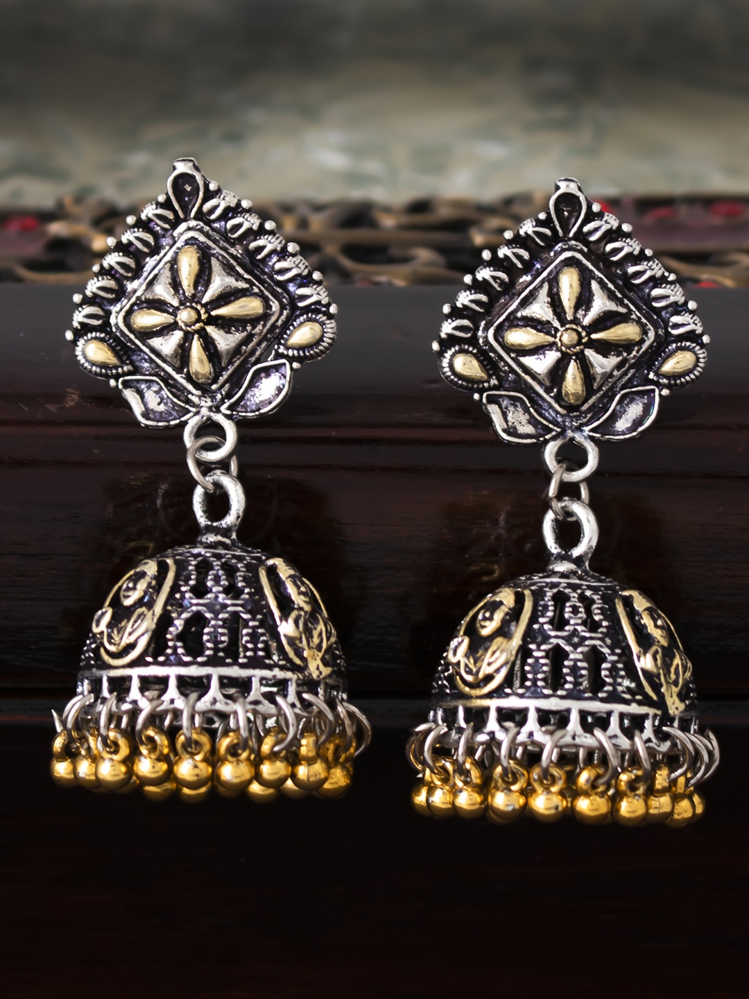 

Sukkhi Silver-Toned Dome Shaped Oxidised Jhumkas