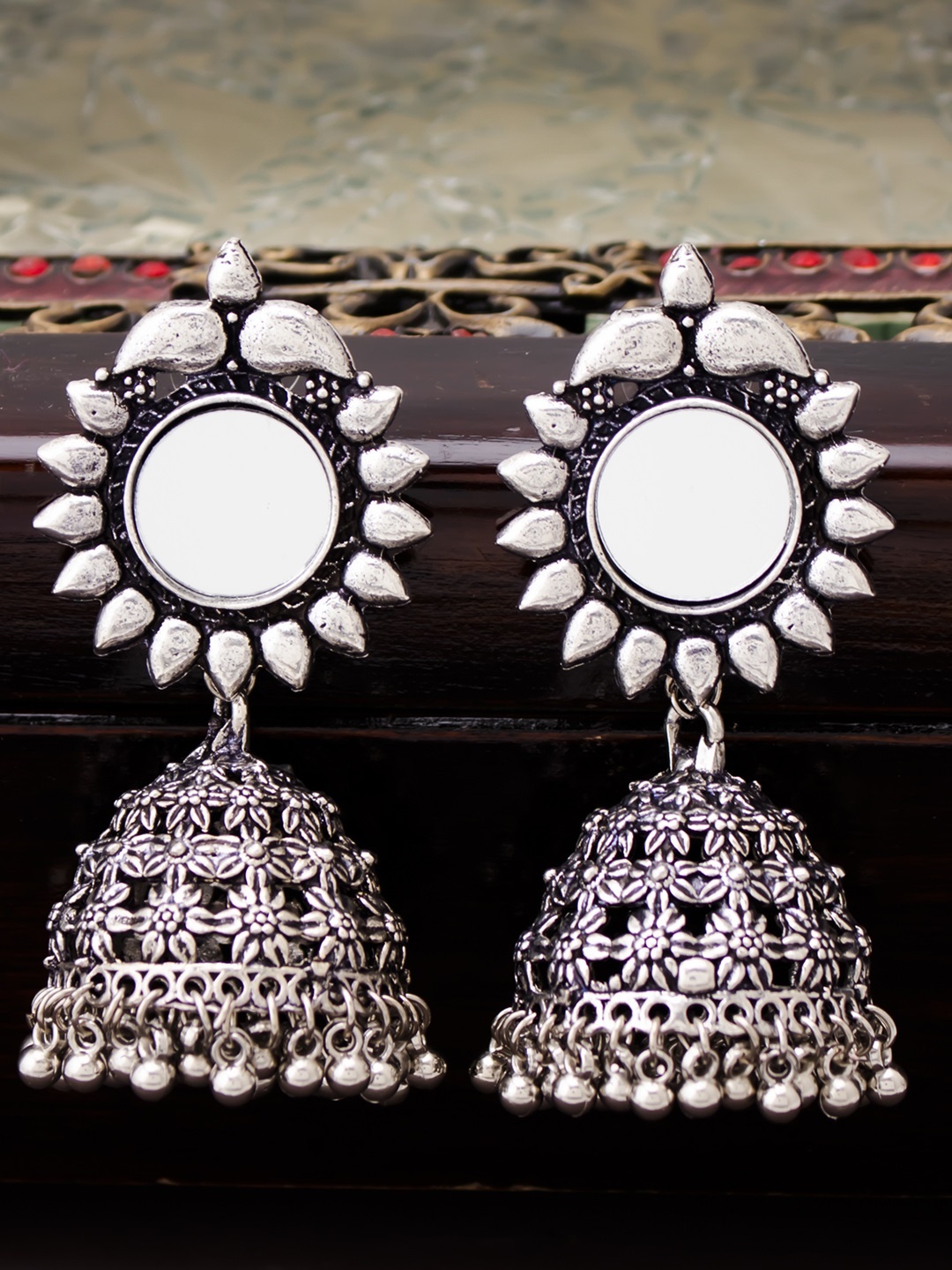 

Sukkhi Silver-Toned Dome Shaped Oxidised Jhumkas