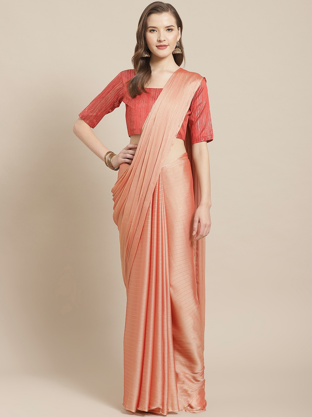 

Saree mall Peach-Coloured Striped Saree with Tassels