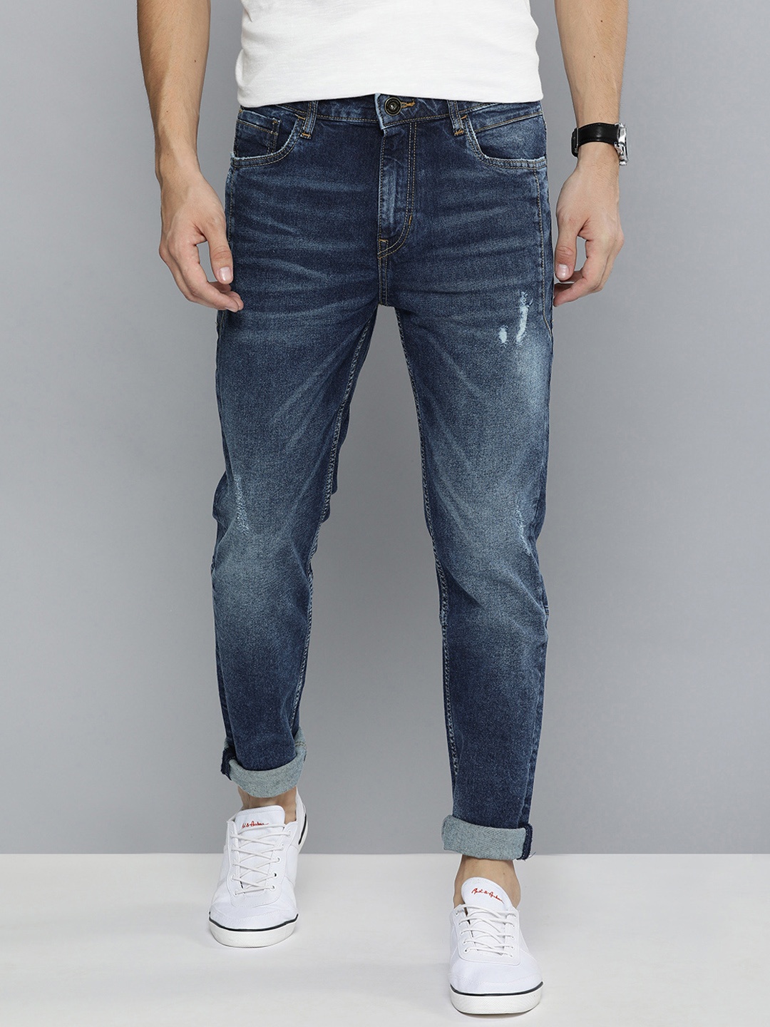 

Mast & Harbour Men Blue Slim Tapered Fit Mid-Rise Low Distress Stretchable Jeans