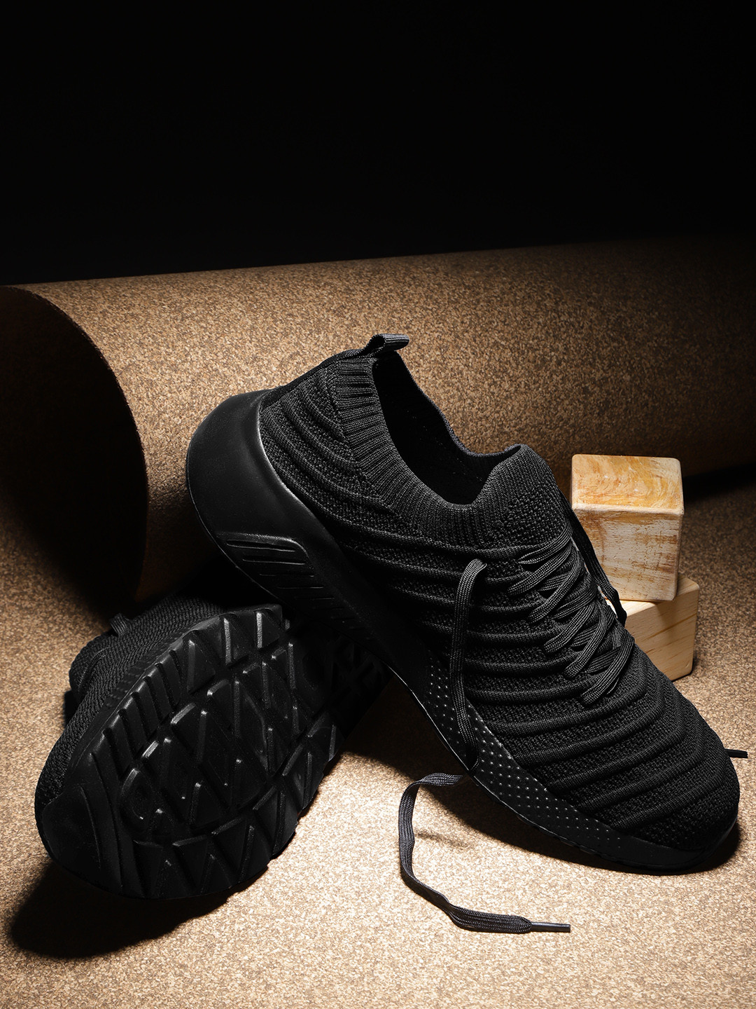 

Roadster Men Black Self Striped Sneakers