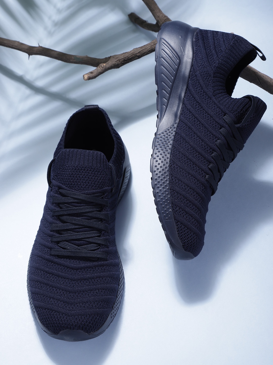 

Roadster Men Navy Blue Solid Sneakers