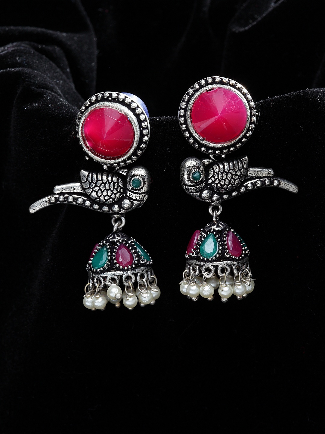 

PANASH Silver-Plated & Pink German Silver Oxidised Peacock Shaped Jhumkas