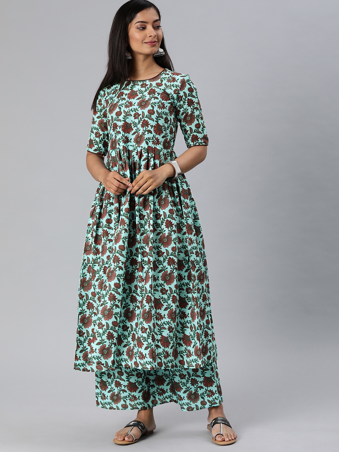 

GoSriKi Women Sea Green & Maroon Floral Printed Kurta with Palazzos