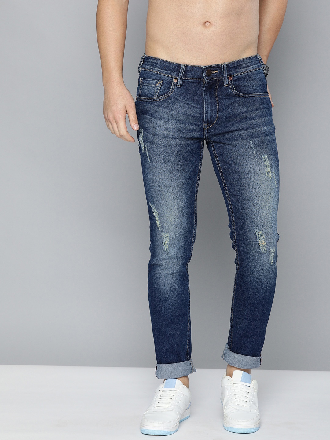 

HERE&NOW Men Blue Slim Fit Mid-Rise Mildly Distressed Stretchable Jeans