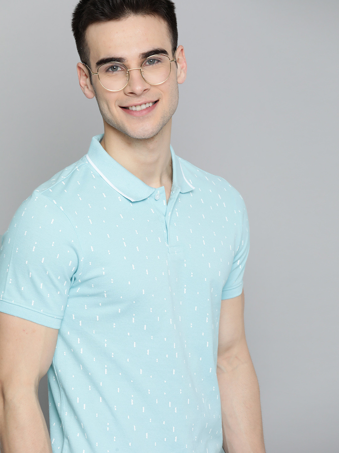 

Mast & Harbour Men Blue & White Printed Cotton Polo Collar T-shirt