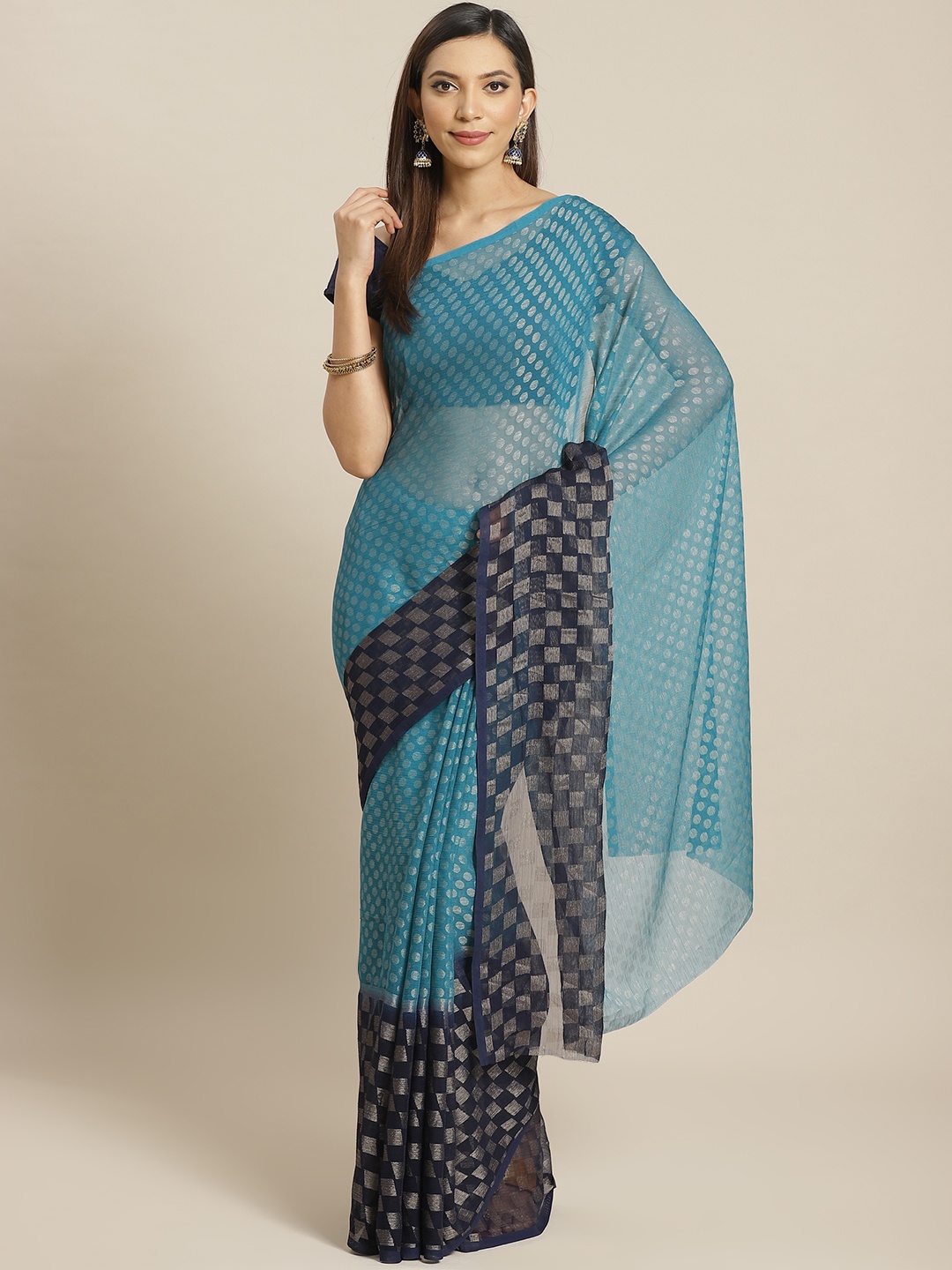 

Mitera Blue Woven Design Brasso Saree