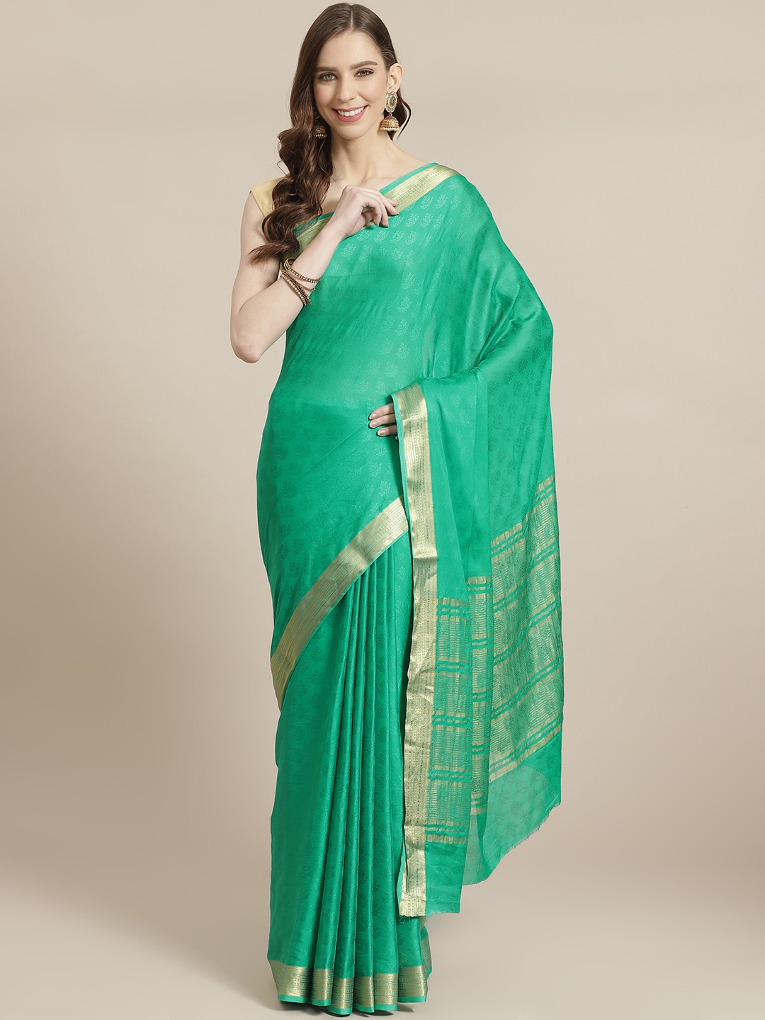 

Mitera Green Woven Design Saree