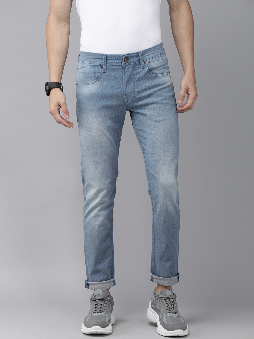 

Pepe Jeans Men Blue Vapour Tapered Fit Low-Rise Clean Look Jeans