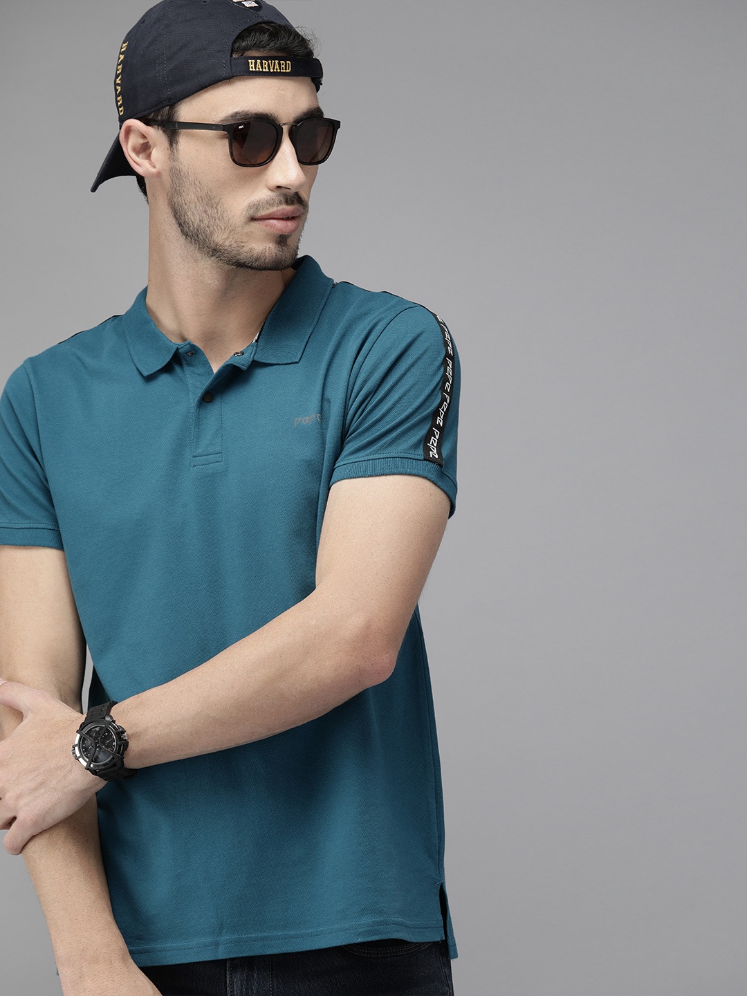 

Pepe Jeans Men Teal Blue Solid Polo Collar T-shirt