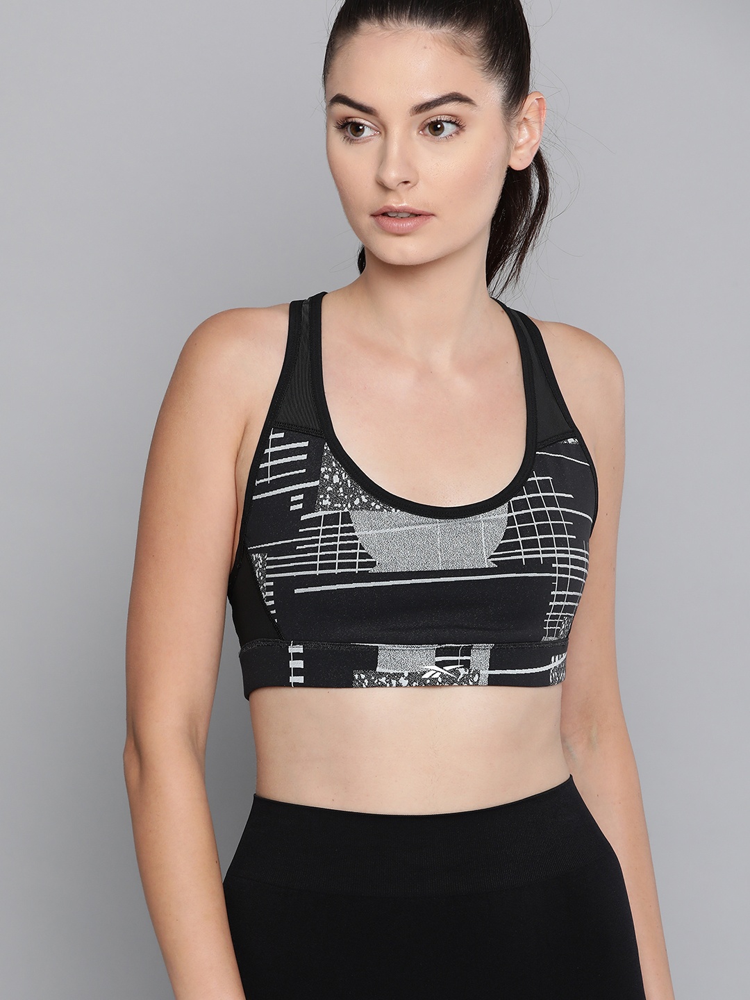 

Reebok Women Black & Grey Hero Deconstructed Racer Sports Bra GE1352