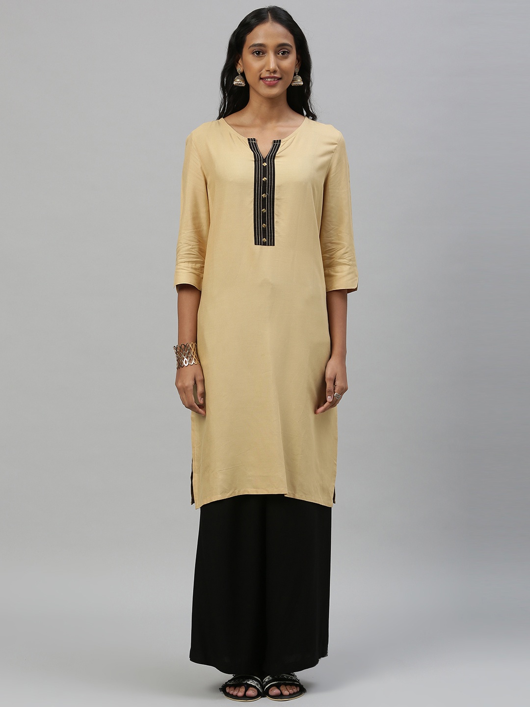 

Anouk Women Beige Solid Straight Kurta