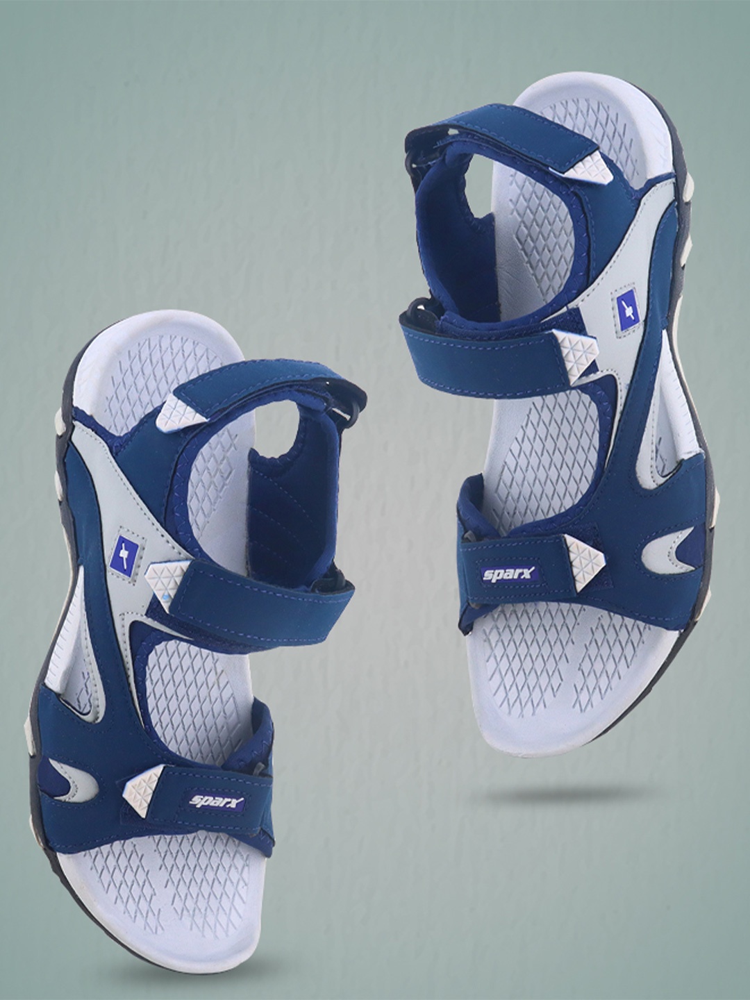 

Sparx Men Blue & Grey Solid Sports Sandals