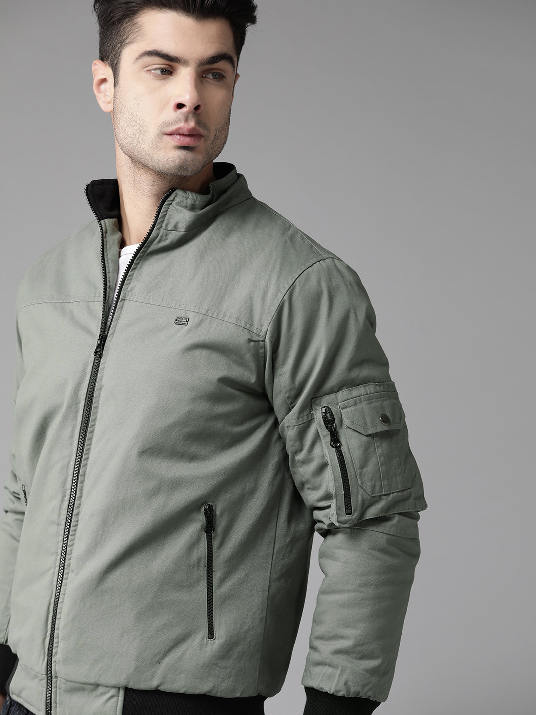 

Roadster Men Olive Green Solid Bomber Jacket