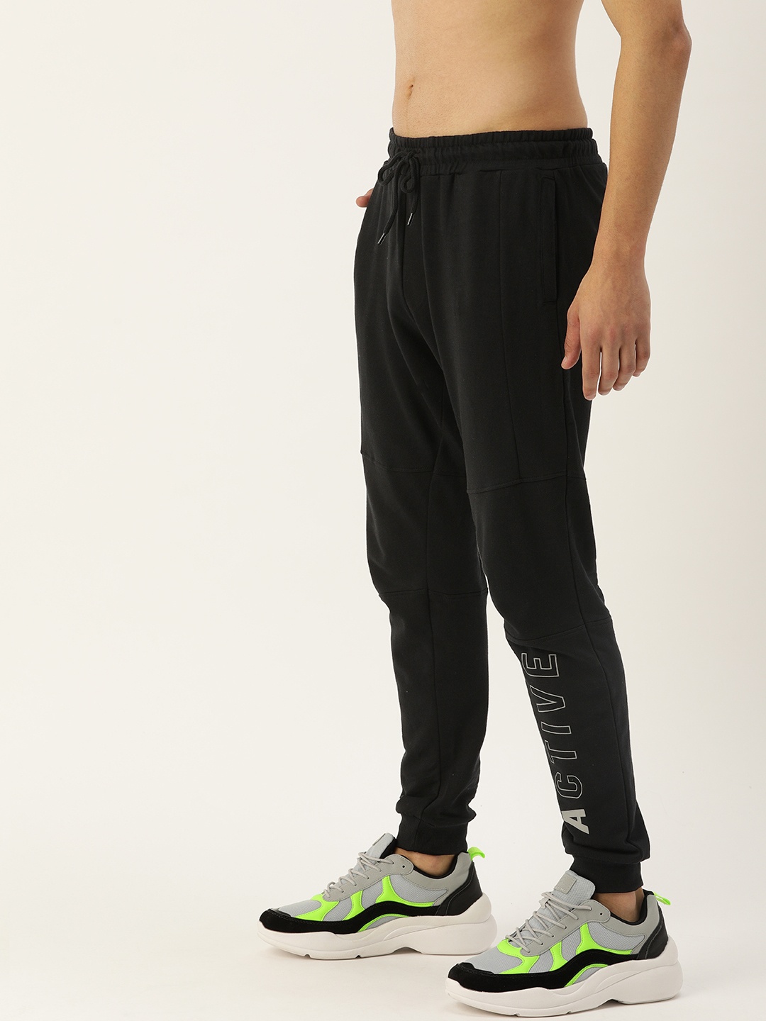 

Flying Machine Men Black Solid Joggers with Printed Detail