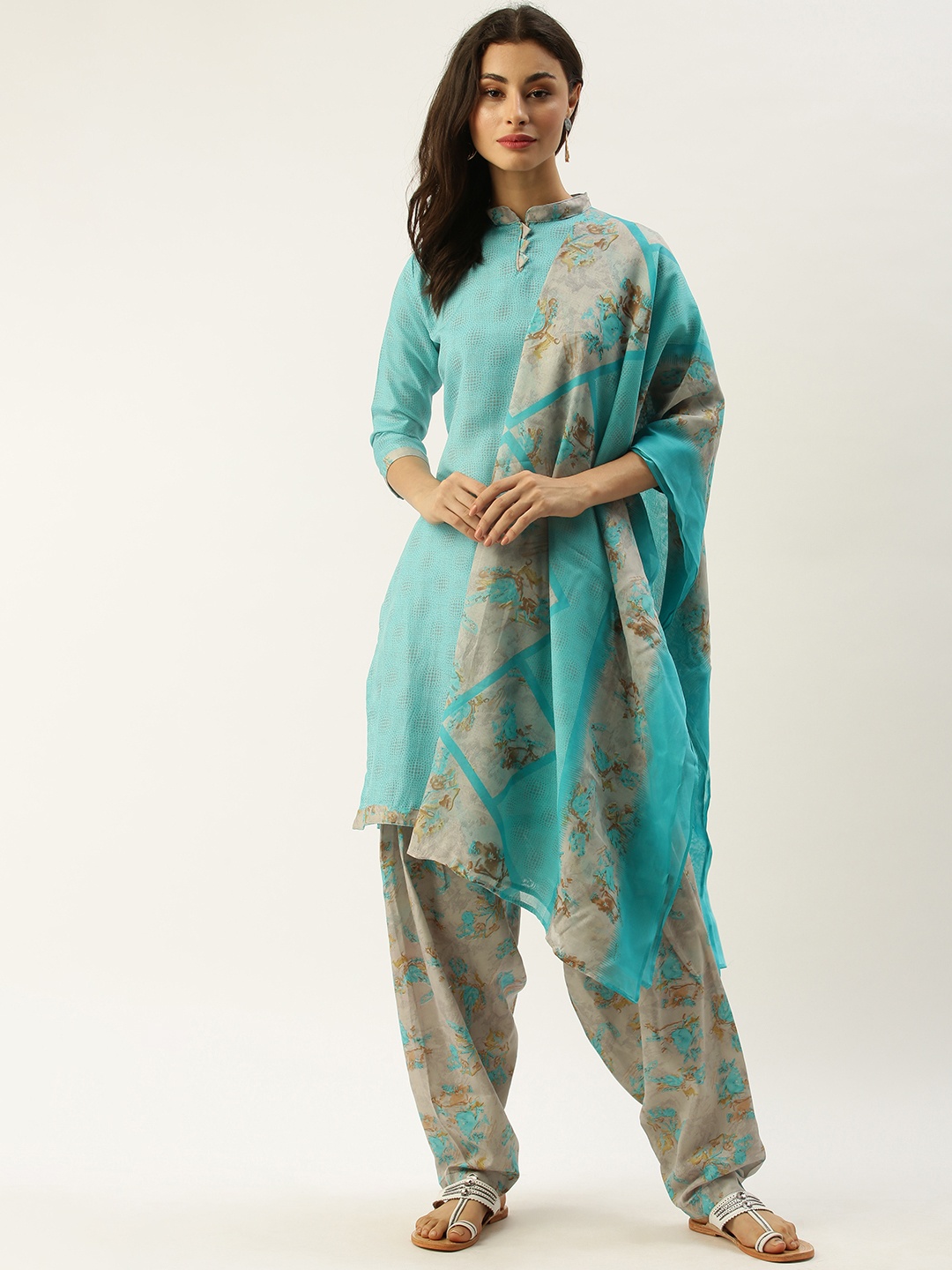 

Rajnandini Turquoise Blue & Grey Cotton Blend Printed Unstitched Dress Material