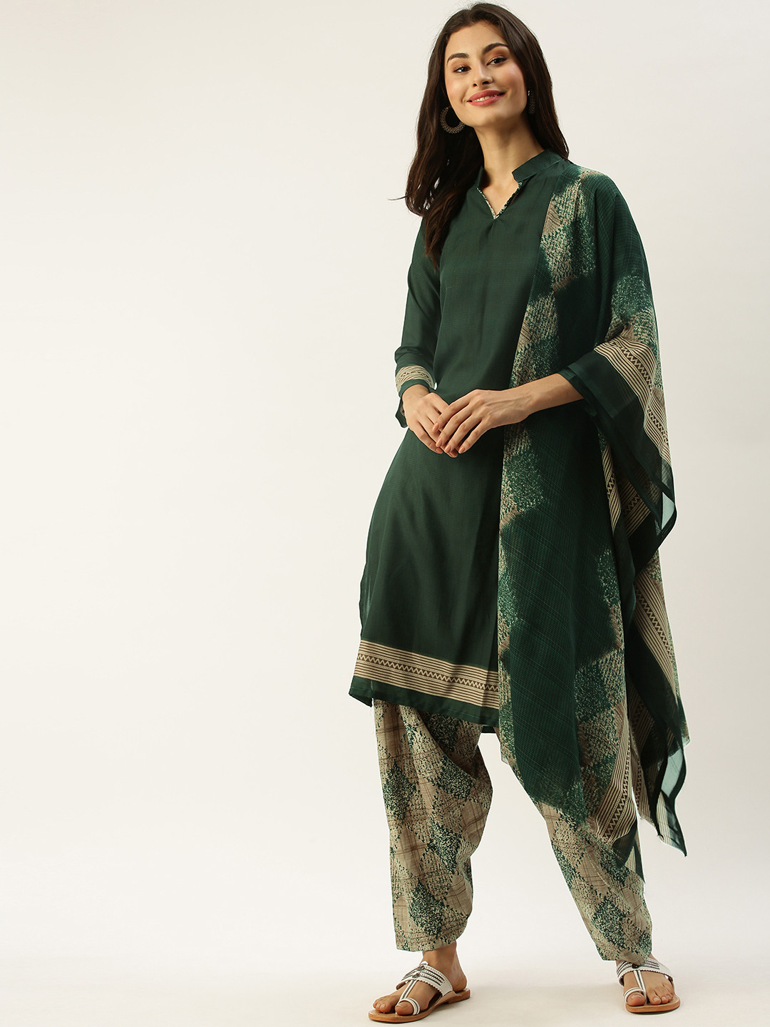 

Rajnandini Green & Beige Poly Crepe Unstitched Dress Material