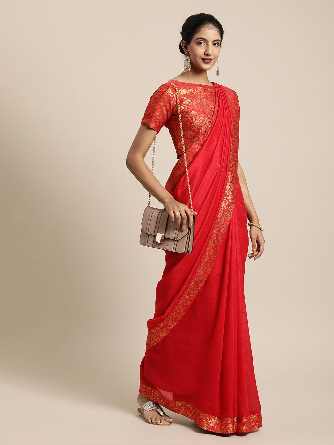 

Inddus Red Solid Silk Blend Saree
