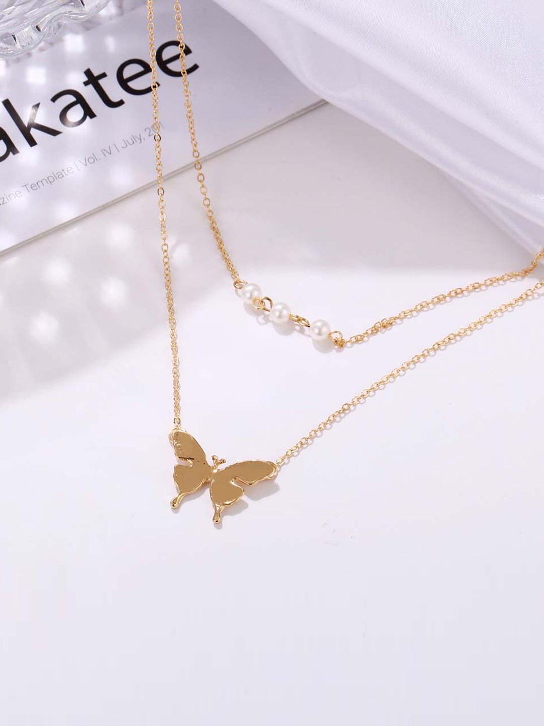 

Jewels Galaxy Women Off-White Gold-Plated Butterfly-Shaped Beaded Layered Necklace
