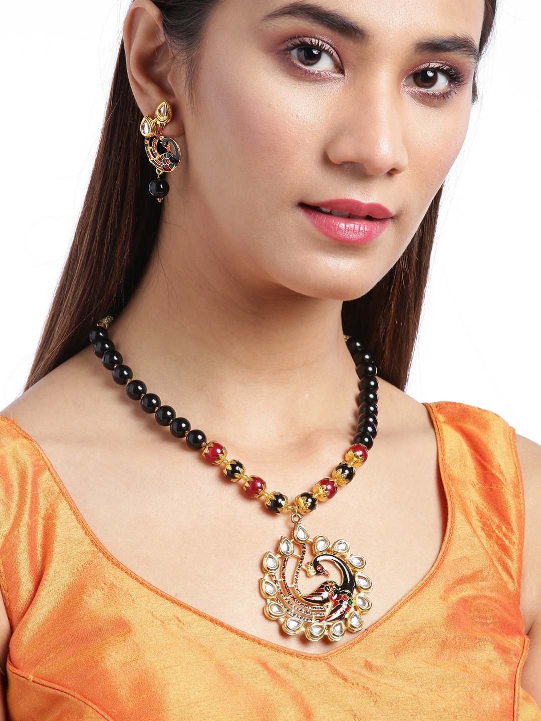 

Jewels Galaxy Black & Red Gold-Plated Peacock-Shaped Stone-Studded & Beaded Jewellery Set