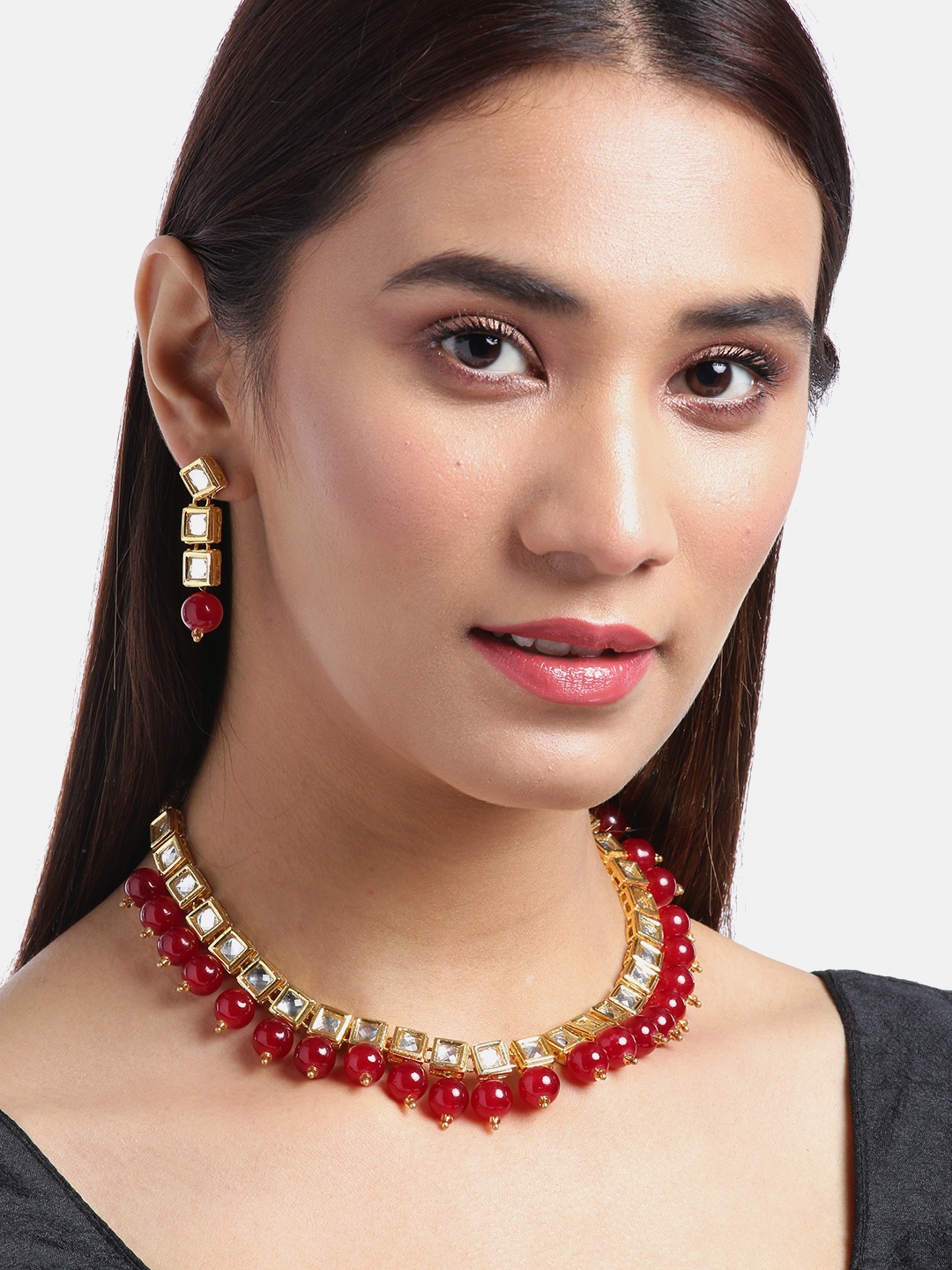 

Jewels Galaxy Women Maroon Gold-Plated Stone-Studded & Beaded Jewellery Set