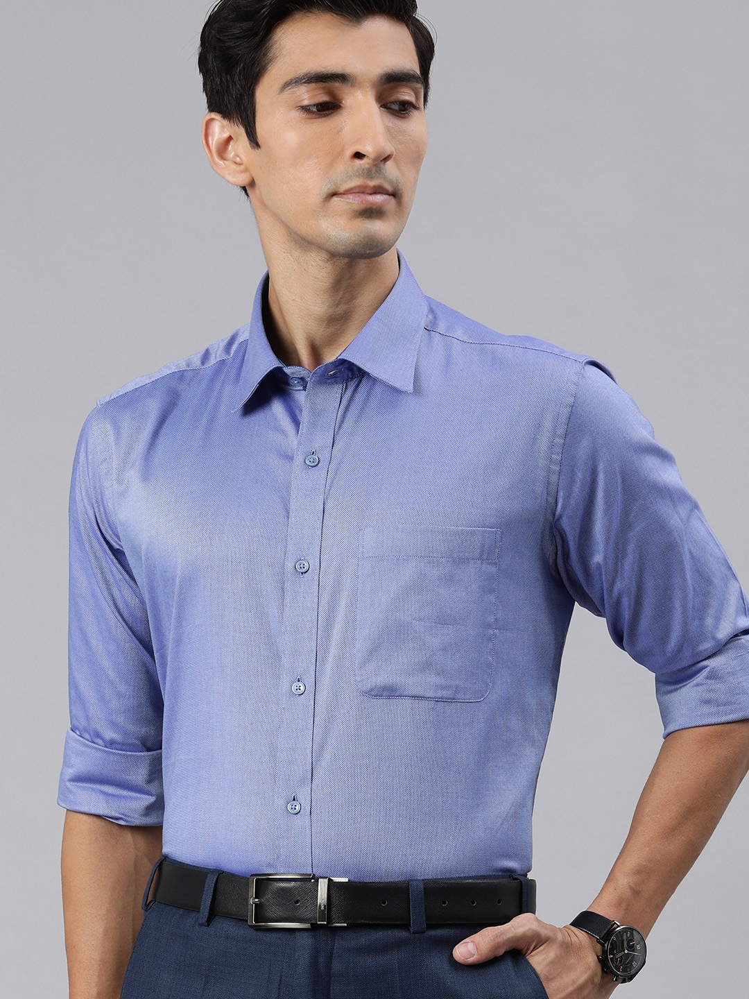 

Raymond Men Blue Regular Fit Self Design Formal Shirt