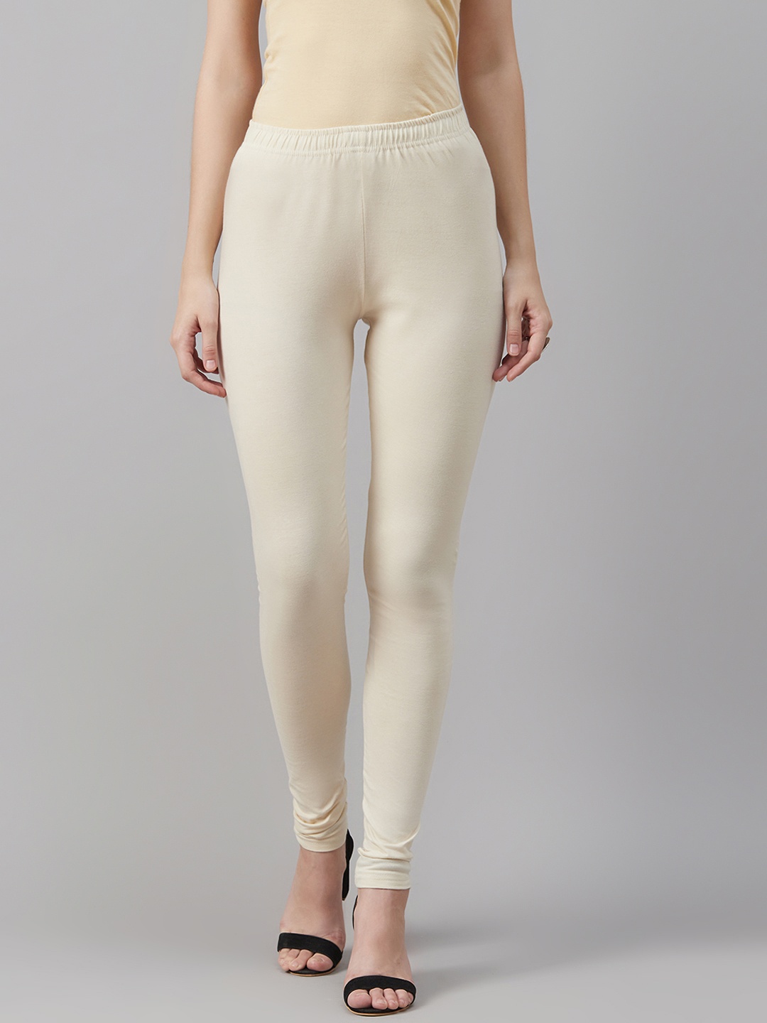 

Biba Women Off White Solid Churidar Length Leggings