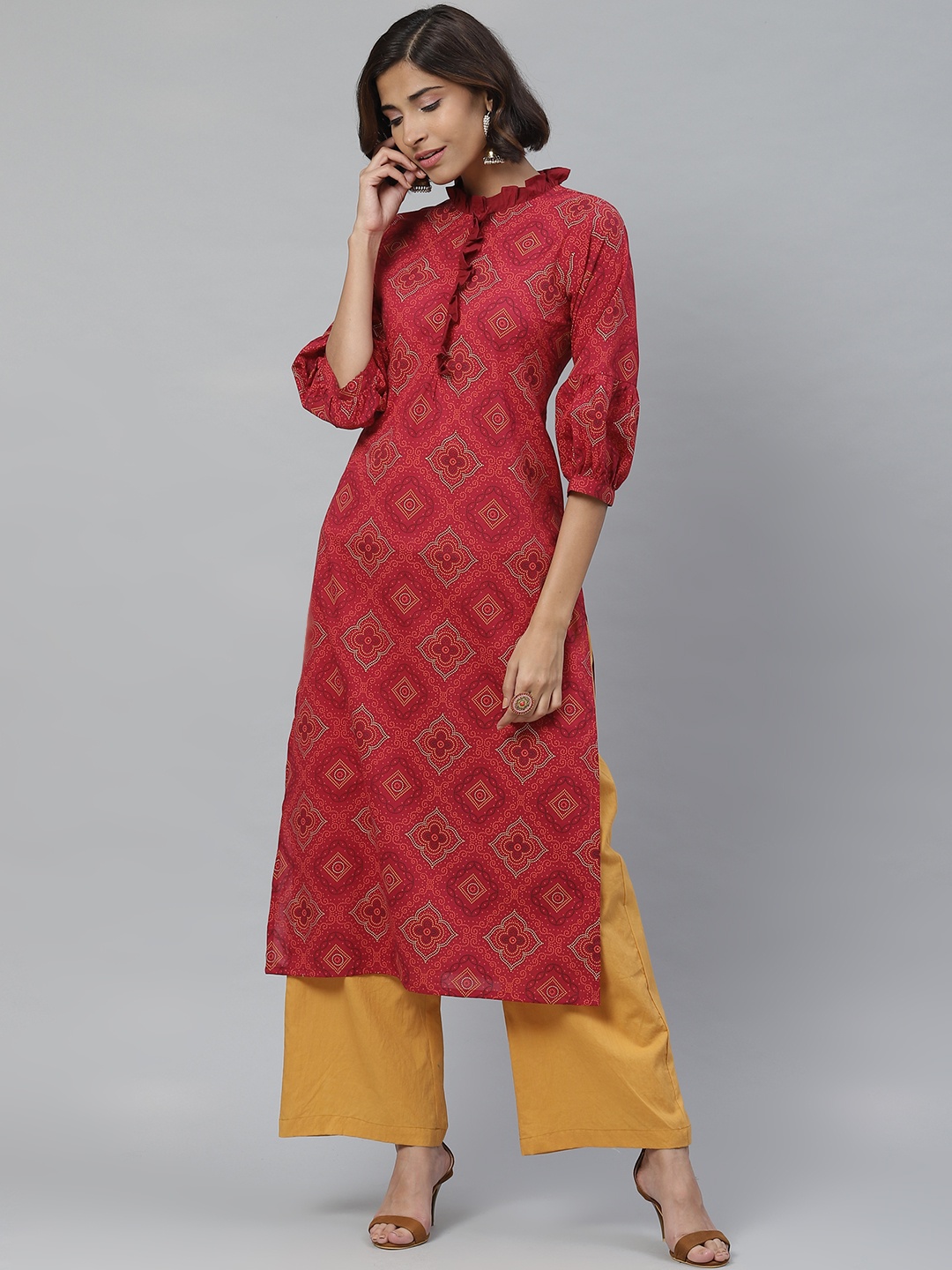 

Yuris Women Maroon & Golden Printed Straight Kurta