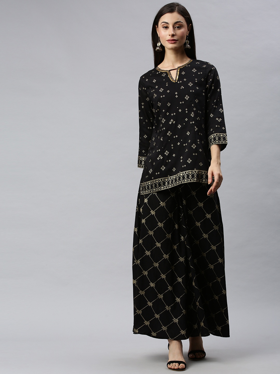 

Global Desi Women Black & Gold-Toned Printed Kurti with Palazzos