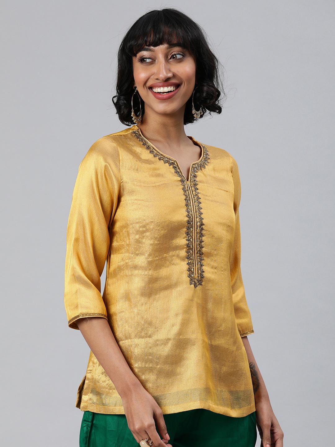 

Biba Women Golden Solid Straight Kurti, Gold