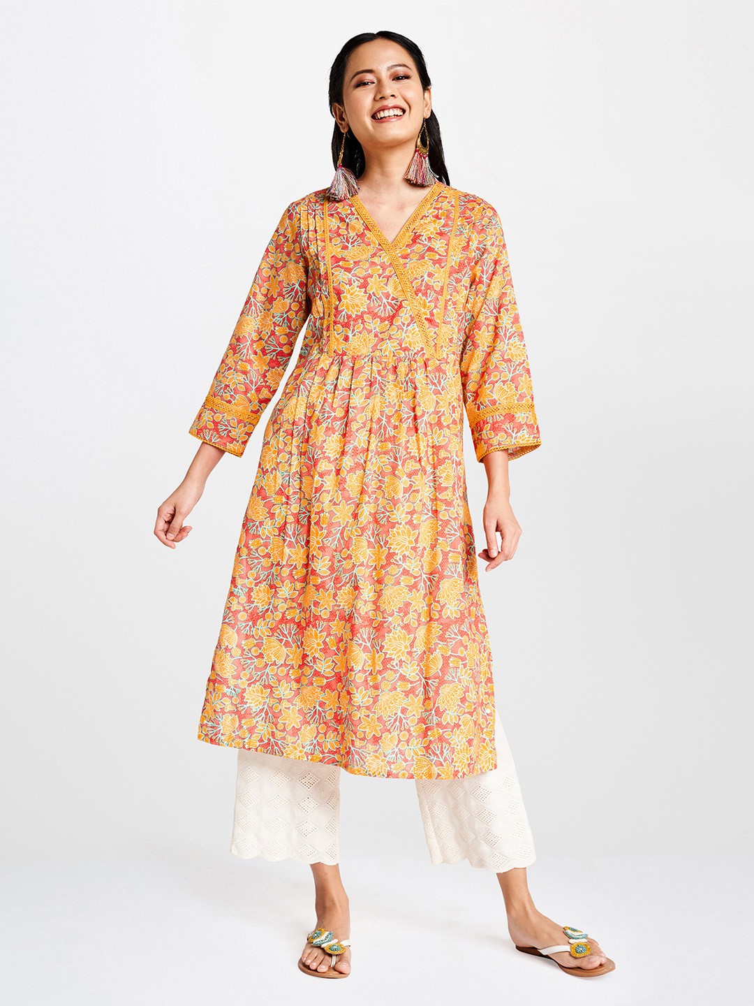 

Global Desi Women Mustard Yellow & Pink Printed A-Line Kurta with Lace Inserts