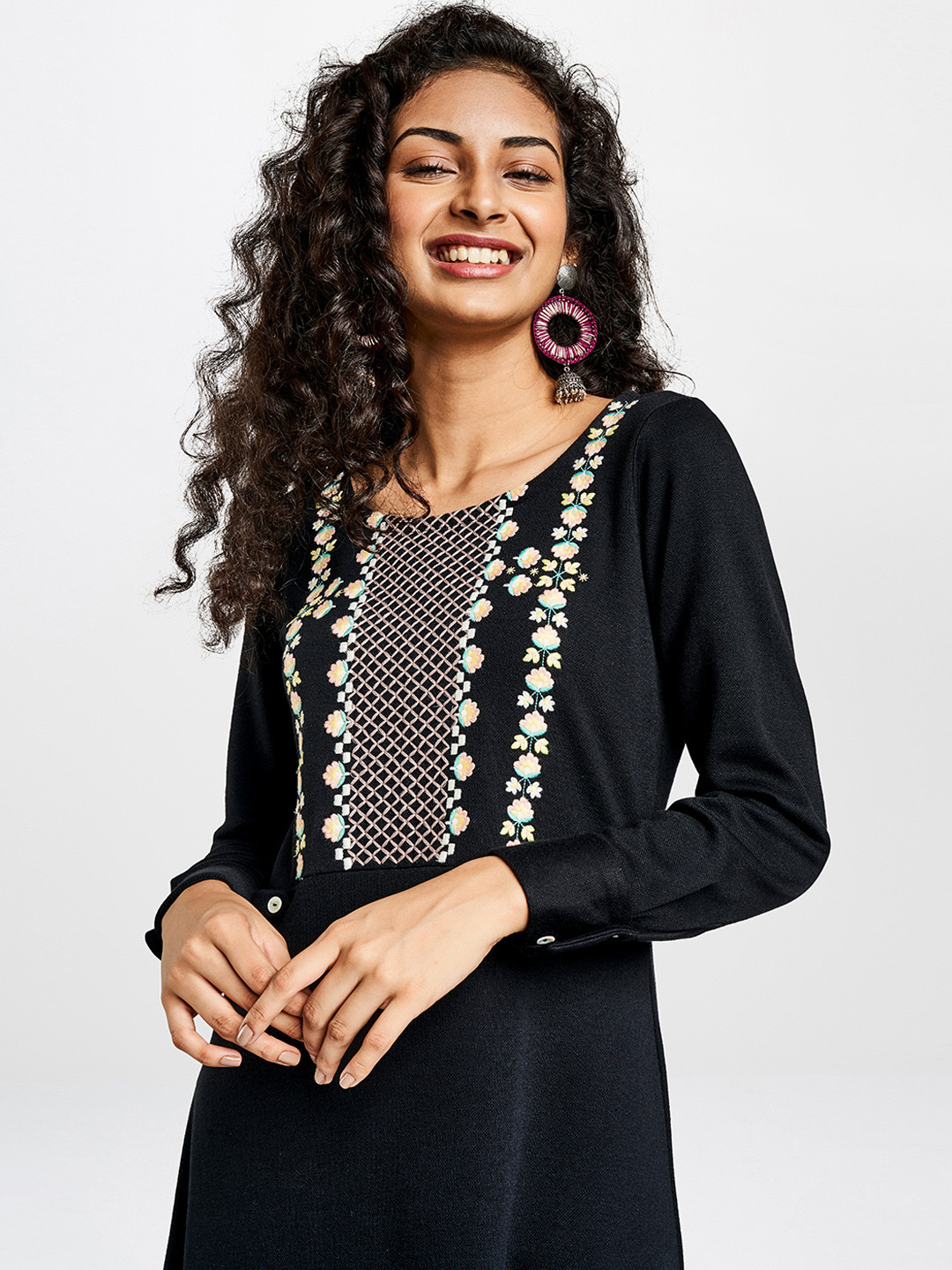 

Global Desi Women Black Floral Embroidered A-Line Sweater Kurta