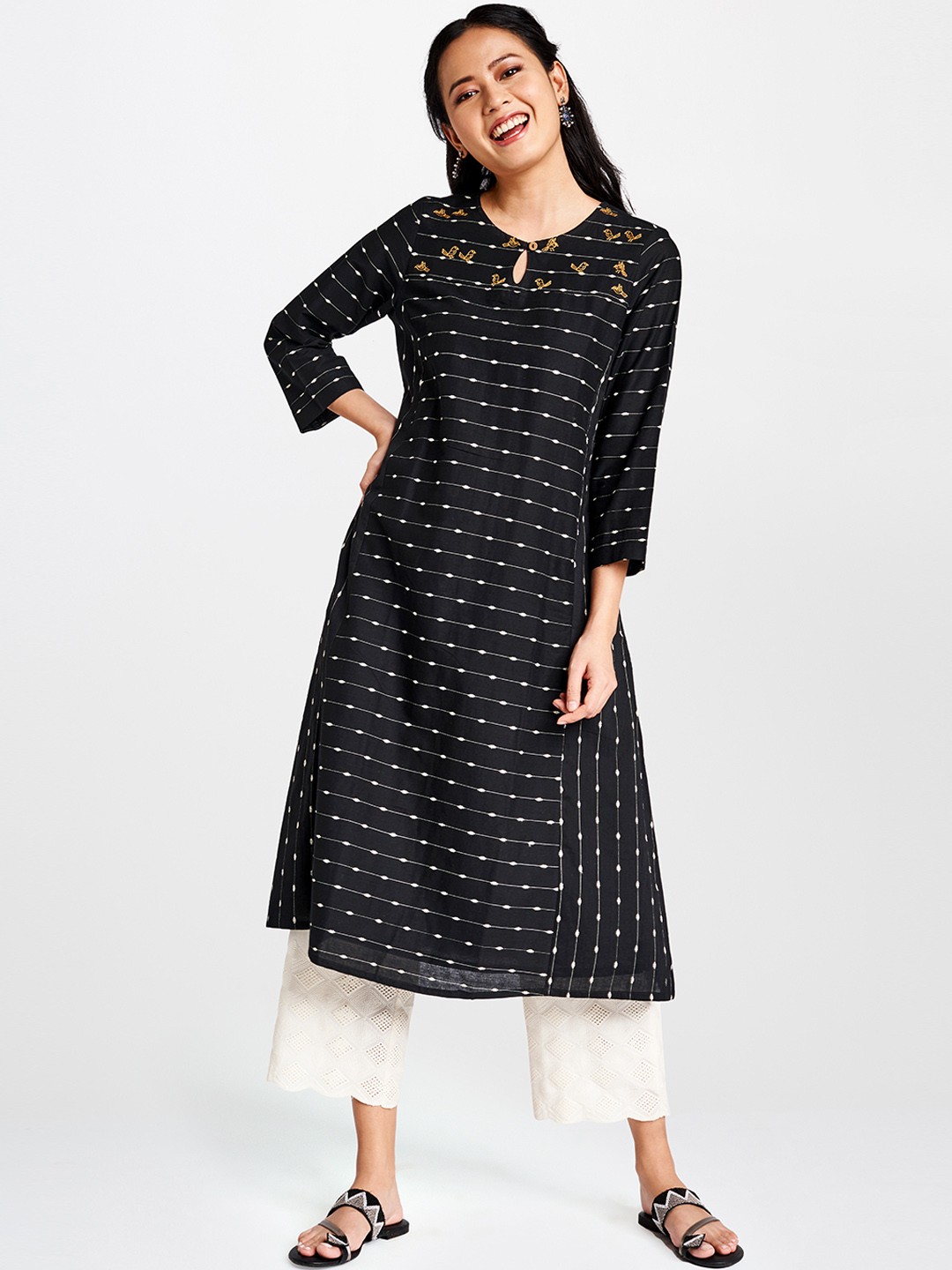 

Global Desi Women Black & White Striped A-Line Kurta with Embroidery