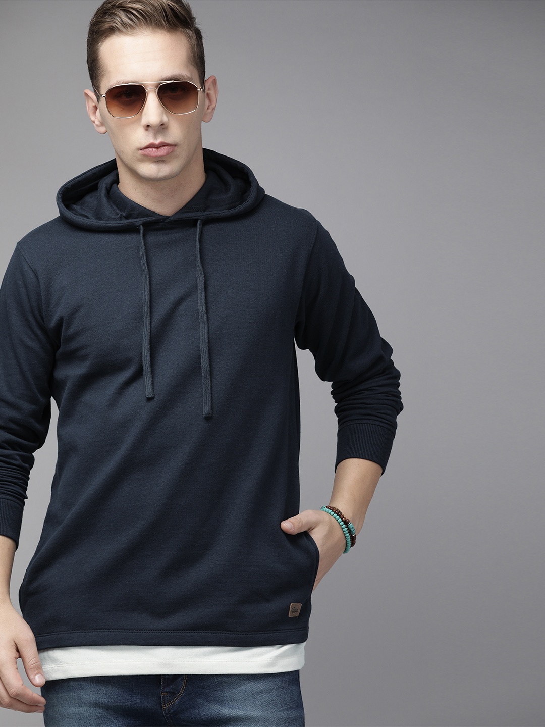 

Roadster Men Navy Blue Solid Hooded Sweatshirt