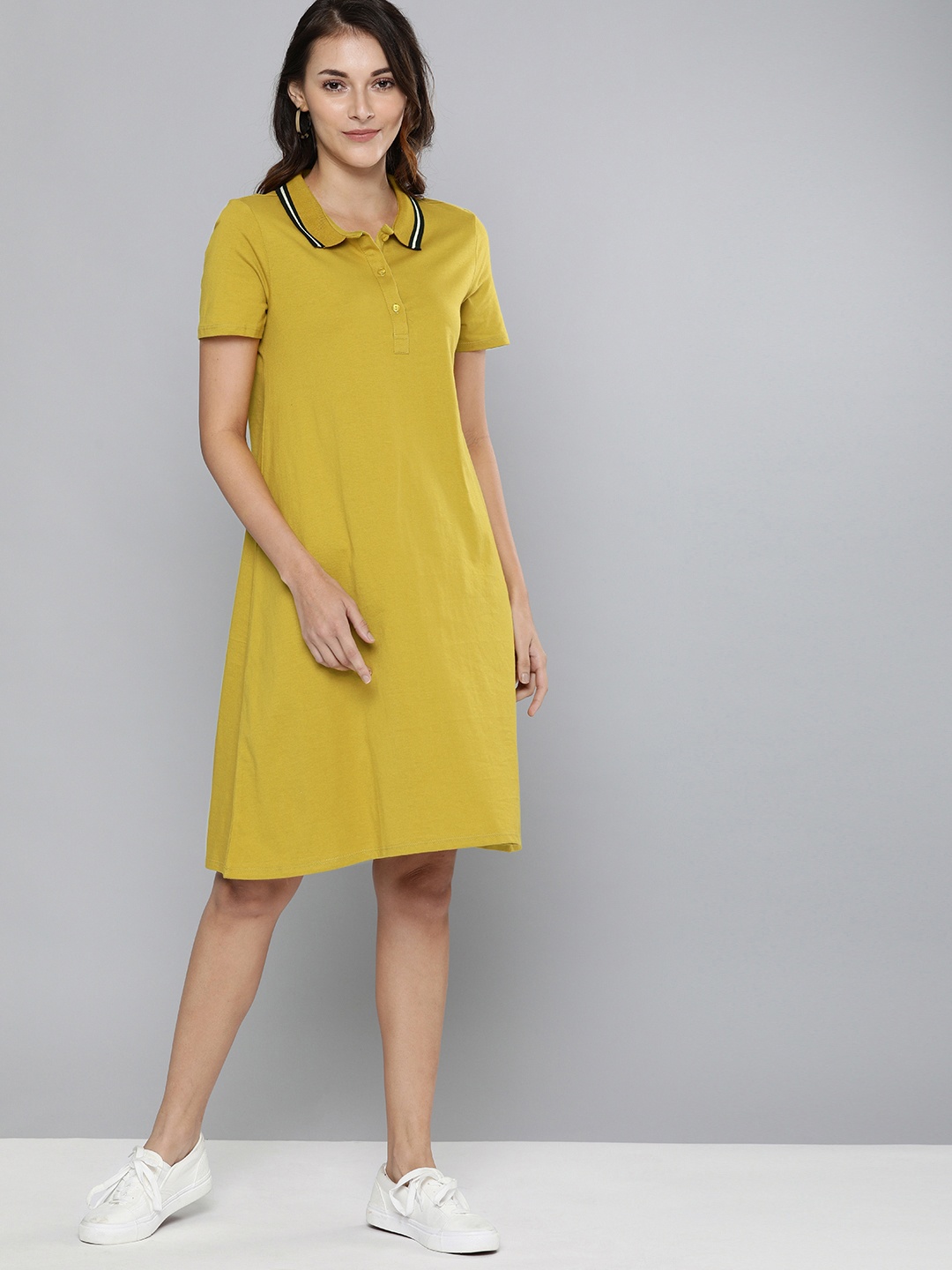 

Chemistry Women Mustard Yellow Solid T-shirt Dress