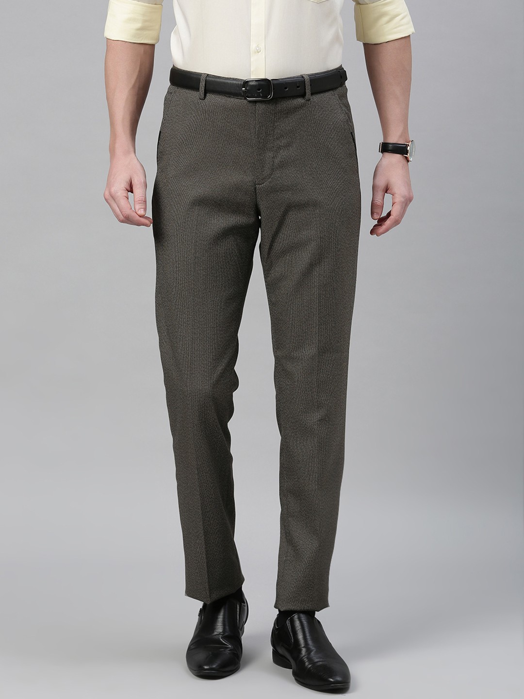 

Arrow New York Men Brown Tapered Fit Solid Regular Trousers