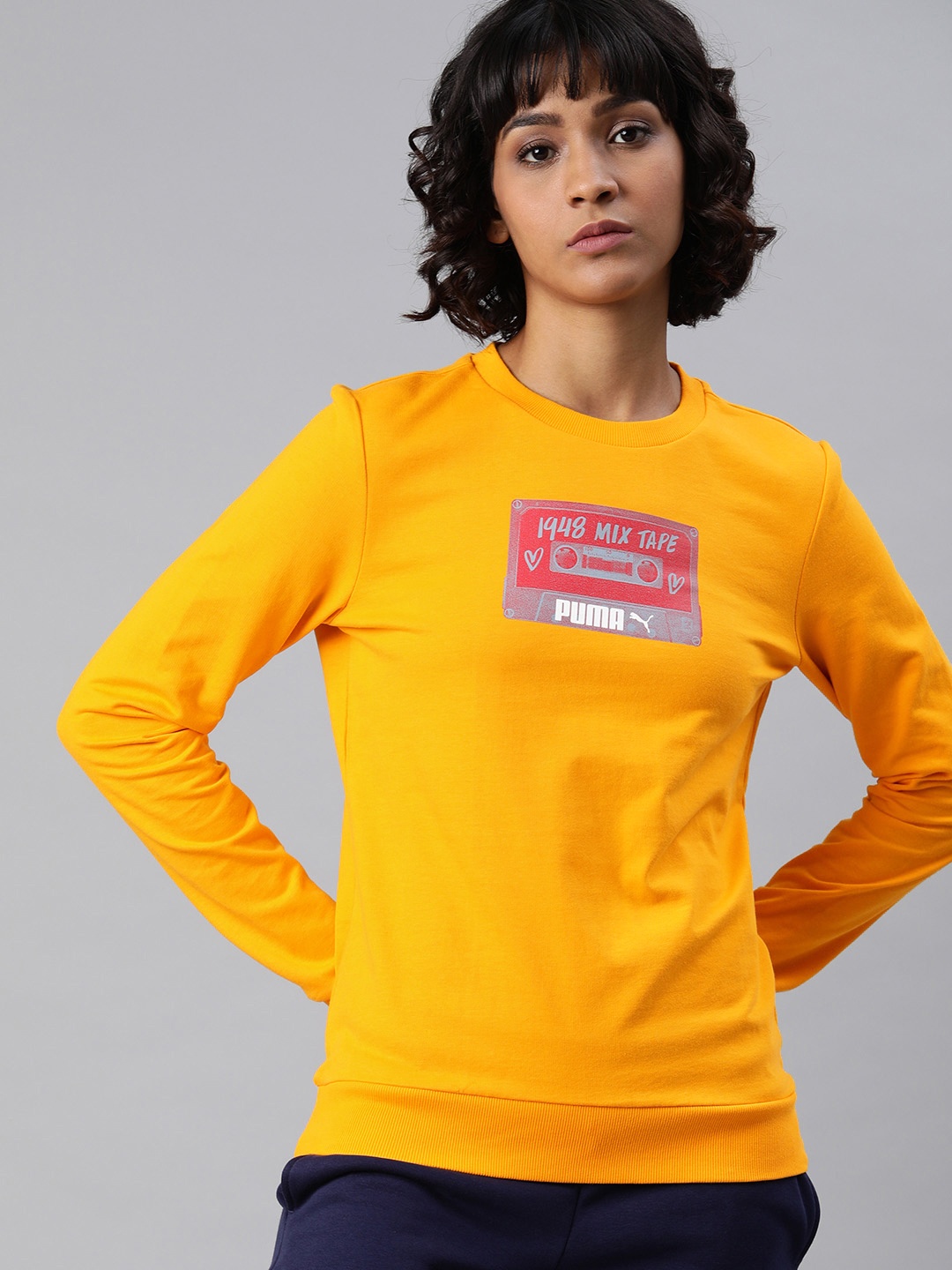 

Puma Women Yellow Mix Tape Graphic Crew Printed Pullover Sweatshirt